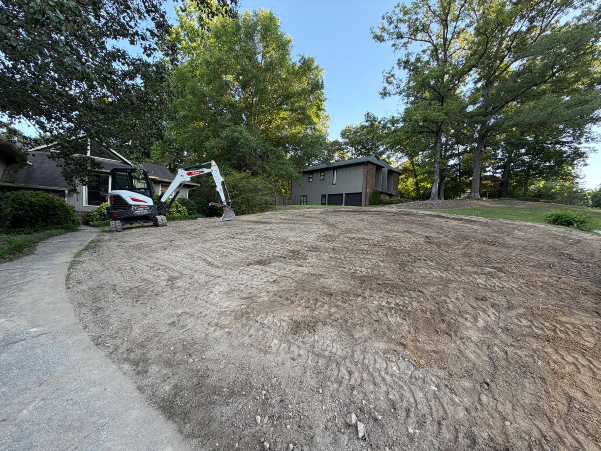 Dirt work and site preparation with equipment